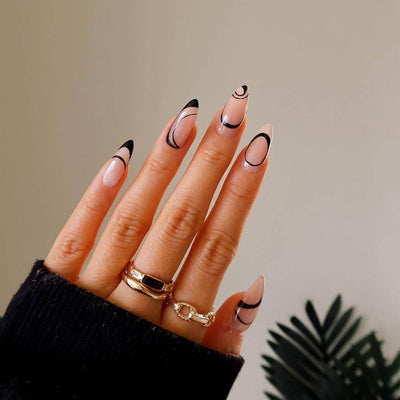 Nordic Wind Wears simple French style nail patches with black abstract lines on almond-shaped nails