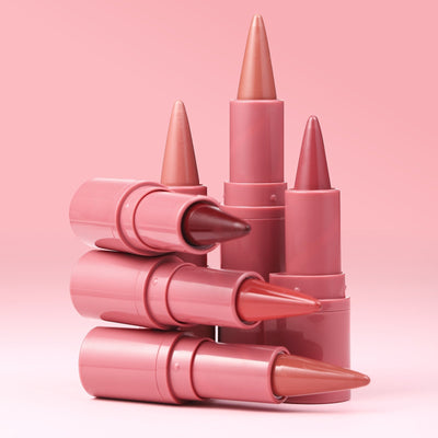 Multifunctional matte lip liner lipstick pen in various shades on pink background